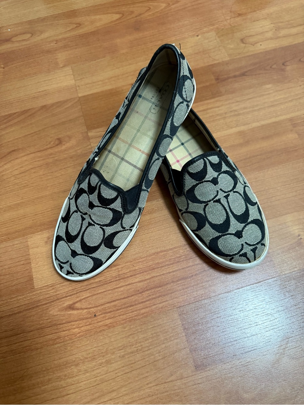 Coach Signature Slip-On Flats in Black and Tan